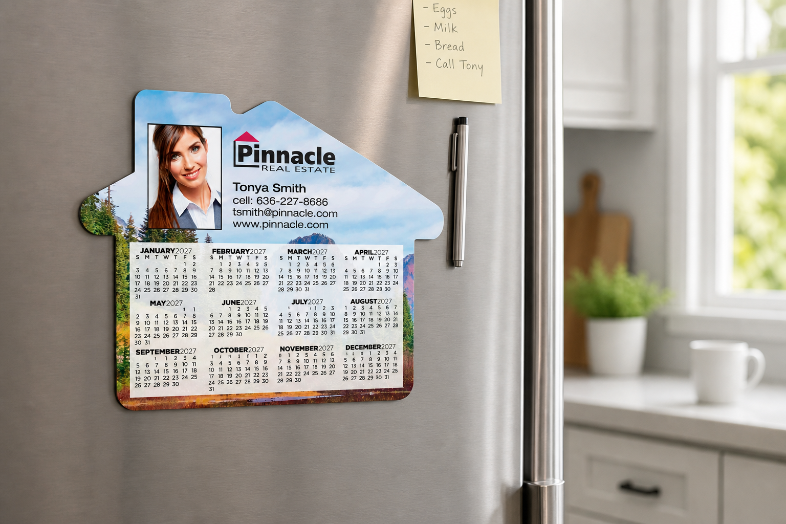 Calendar House Magnet displayed on a refrigerator in a bright home workspace
