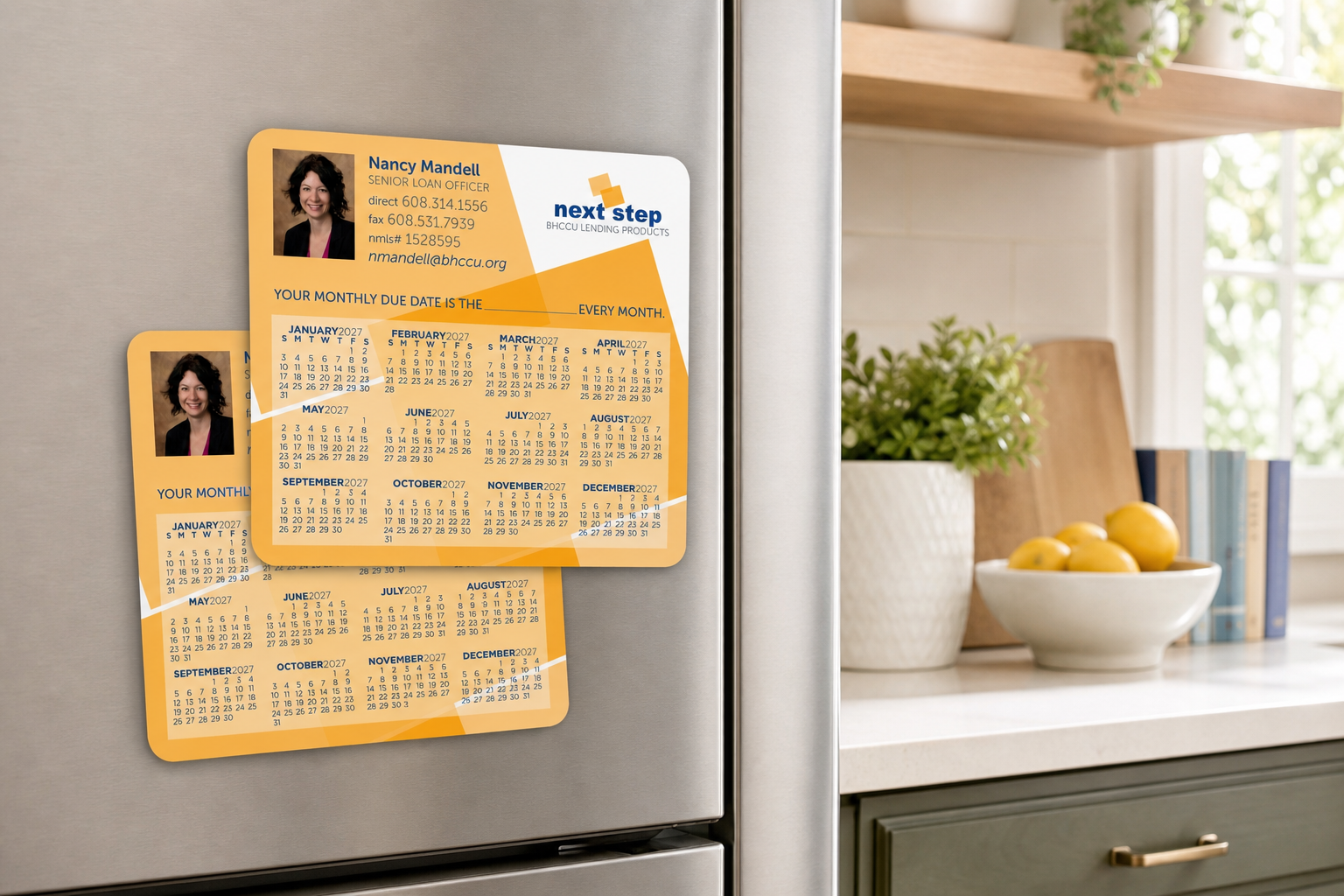 Double Sided Calendar Magnet displayed on a refrigerator in a bright home workspace